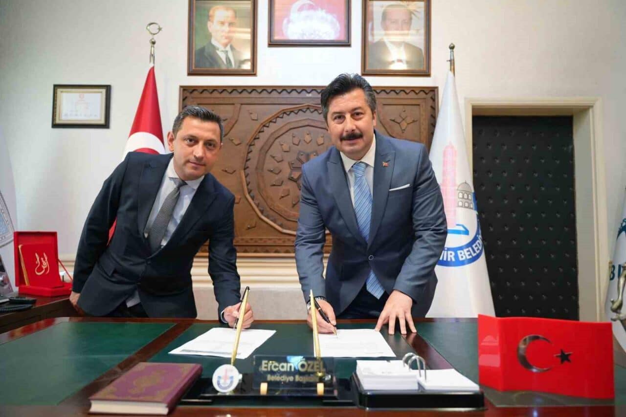 Yenişehir Belediye Başkanı Ercan Özel, Halk Bankası Yenişehir Şube Müdürü