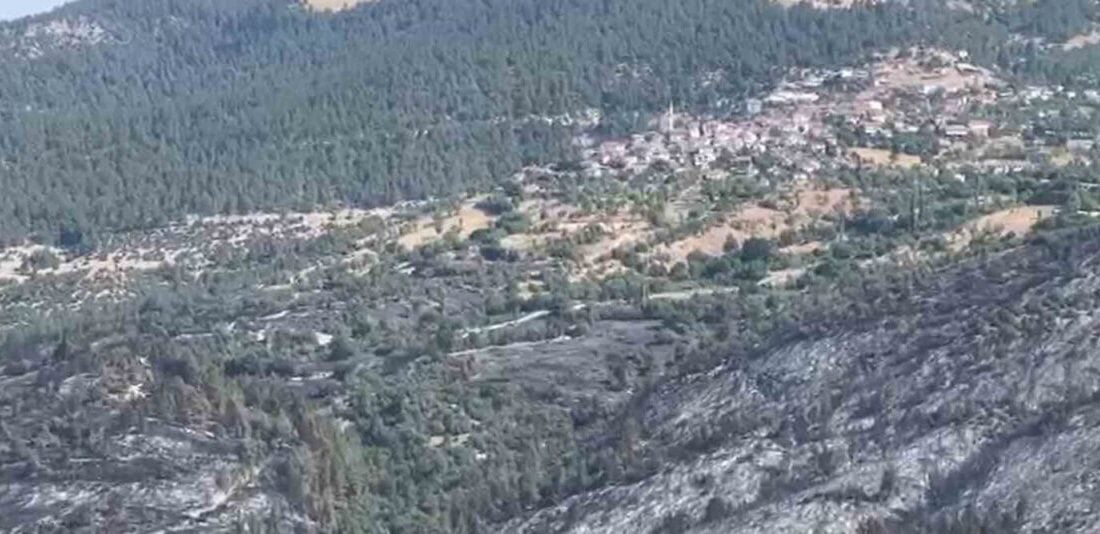 Bursa'dan başlayıp Balıkesir'in Dursunbey ilçesine ulaşan orman yangınında soğutma çalışmaları