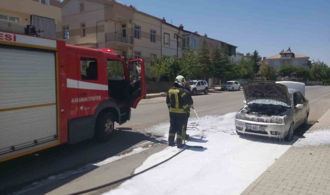 Karaman'ın Mümine Hatun Mahallesi'nde park halindeki otomobilin motor kısmında yangın