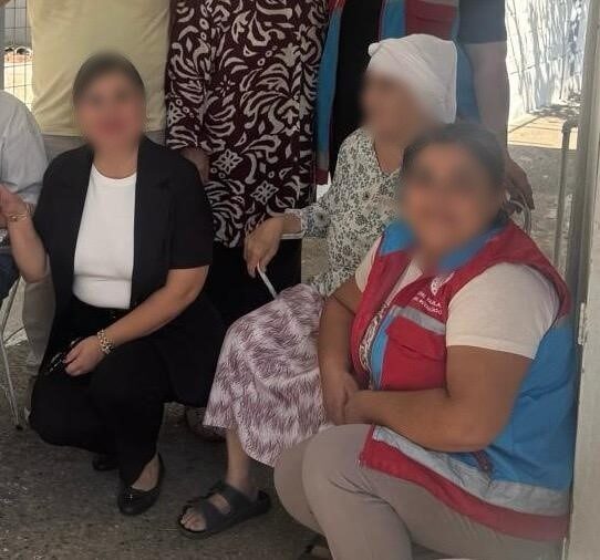 Marmaris Sosyal Yardımlaşma ve Dayanışma Vakfı’nın Müdürü E.K.Ç. ile çalışanları