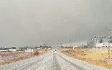 Adıyaman'da Kahta-Sincik yolundaki Türkiye Petrolleri tesisleri çevresinde şiddetli dolu yağışı