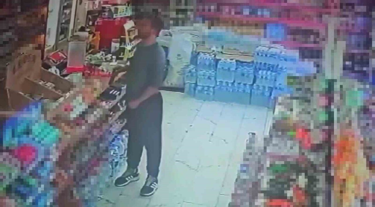 Adana'nın Çukurova ilçesinde bir markette, kimliği belirsiz bir şahıs, market