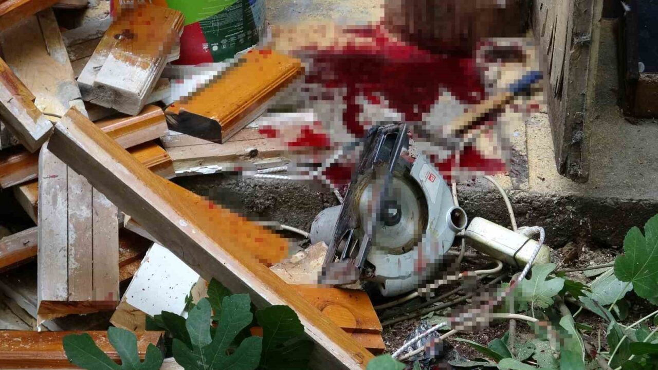 Antalya'nın Kepez ilçesinde 76 yaşındaki Yaşar Özer, odunlukta elektrikli testere