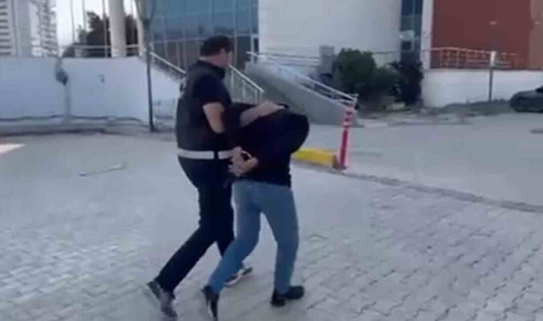 İskenderun’da Emniyet, Dolandırıcılıktan Aranan K.C.’yi Yakaladı Hatay'ın İskenderun ilçesinde, banka dolandırıcılığı nedeniyle 6 yıl hapis cezası