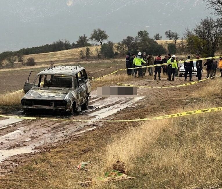 Isparta'nın Keçiborlu ilçesinde, Aydoğmuş köyünde yanmış bir aracın yakınında Ferdi
