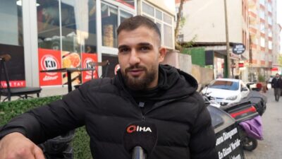 Muş'ta trafik polisi Rıdvan Dağdemir, sokağa çıkan kuryeye, üşüdüğü için