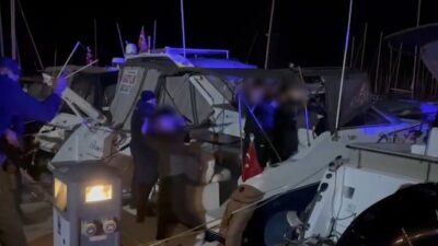 Aydın'ın Kuşadası ilçesinde düzenlenen operasyonda, yurtdışına kaçmaya çalışan dört organize