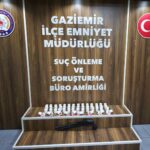Gaziemir’de Polisin Düzenlediği Operasyonda 2.550 Adet Sentetik İlaç ve Silah Ele Geçirildi